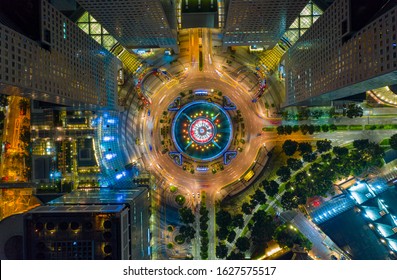 Top View Of The Singapore Landmark Financial Business District With Skyscraper. Fountain Of Wealth At Suntec City In Singapore At Night