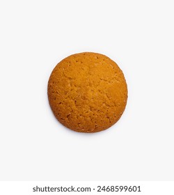 Top view of a single ginger snap cookie isolated on a crisp white background