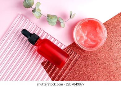 Top View Of Skin Exfoliation Cosmetic Set. Liquid Peeling Serum With Enzymes And Fruit Acid Scrub With Small Particles In Red Packaging. Skin Care Cosmetics In Blank Package. Mockup