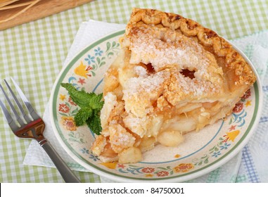 Top View Of A Slice Of Apple Pie On A Plate