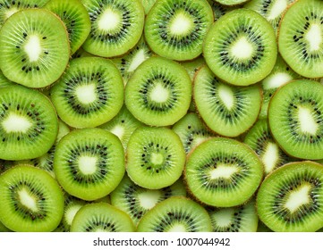 top view of sliced kiwi as background