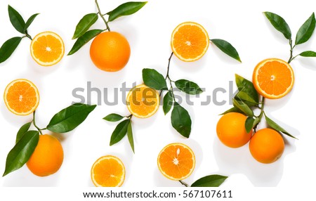 Top view of slices, whole of orange fruits and leaves isolated on white background.