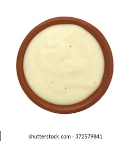 Top View Of A Small Bowl Of Blue Cheese Salad Dressing Isolated On A White Background.