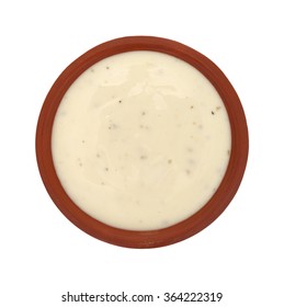 Top View Of A Small Bowl Of Ranch Dressing Isolated On A White Background.