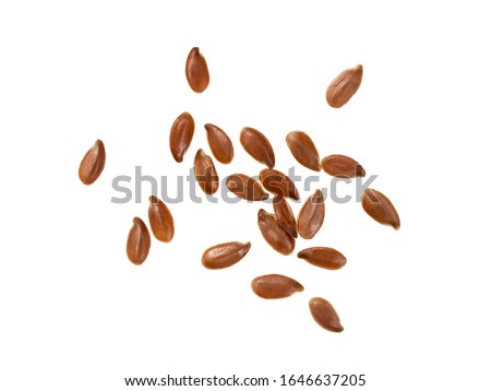 Top view of small group of linseeds or flax seeds isolated on white background