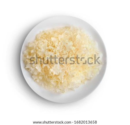 Top view of snow fungus on plate isolated on white background