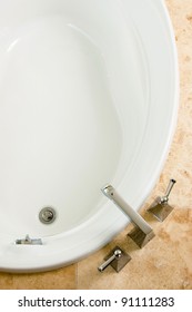 Top View Of Soaking Tub In Stone Surround