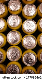 Top view of soda cans. Pattern of many aluminum cans together. 