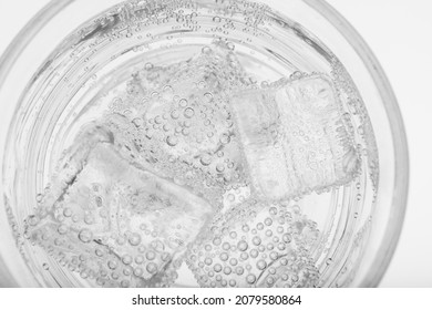 Top View Of Soda Water With Ice In Glass