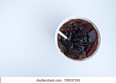 Top View Of Soft Drink In Plastic Cup Isolated On White Background