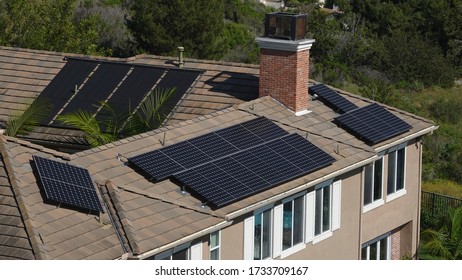 Top View Of Solar Panels Installed On A Roof  In California                             