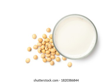 Top view of Soy milk with soybeans isolated on white background.