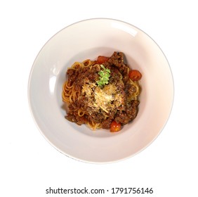top view spaghetti tomato sauce in white p;at isolated on white back ground with clipping path