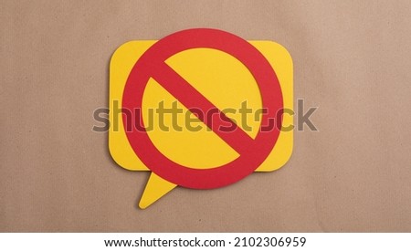 A top view of a speech bubble icon with a prohibition sign