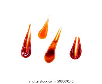 Top View Splashes, Droplets And Spilled Chili, Ketchup, Soy, Barbecue Sauce On White Background, Isolated. Blots Of Hot Chili Pepper, Flat Lay.