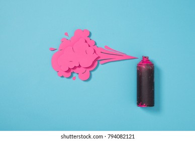 top view of spray paint in can and paper splashes isolated on blue - Shutterstock ID 794082121