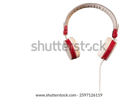 Top view of Spring floral composition with headphones and variety of flowers and leaves on wooden table