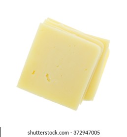 Top View Of A Stack Of Square Cheddar Cheese Slices Isolated On A White Background.