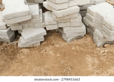 Top view of stacked concrete blocks with large empty space for text and advertising. Perfect for construction industry, architecture and engineering templates.