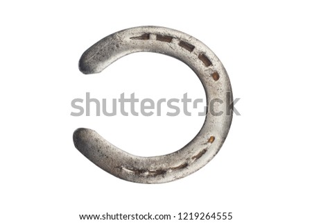 top view of steel polished horseshoe isolated on white