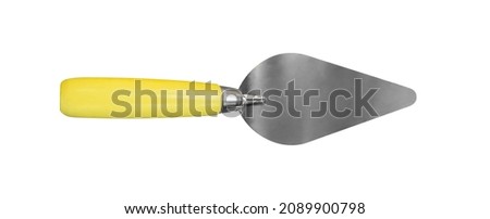 Top view steel trowel used for masonry and plastering isolated on white background