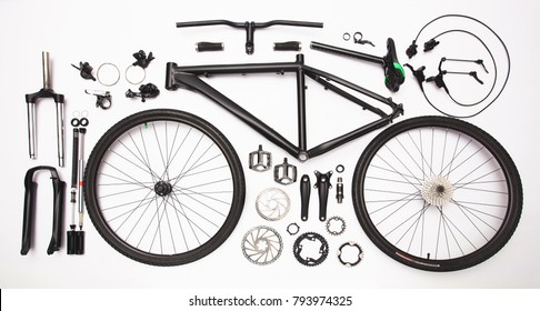 top view still life of bicycle parts, and equipment on the white background