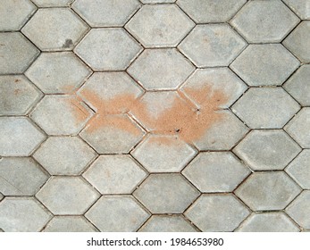 Top view of Street hexagonal cobblestone sidewalk, Flaking the soil of an ant's nest on a brick floor Abstract background for design