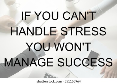 Top view of a strong handshake between man and woman. Photo with motivational text "If you can't handle stress you will not manage success". Business concept photo.