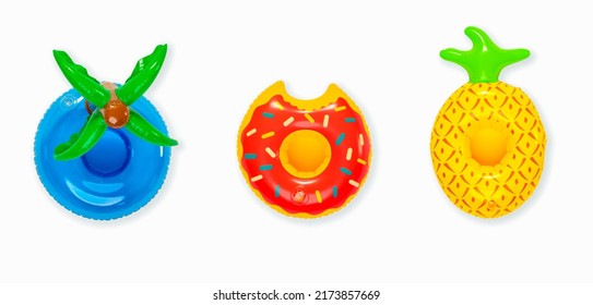 Top view studio isolated shot colorful coconut tree leaves, bitten glazed donut and pineapple round shape swimming pool lifesaver kid rubber ring use on sea beach travel vacation on white background. - Shutterstock ID 2173857669