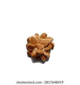 Top view studio shot of a single baked flower shaped sweet bread roll traditional Guatemalan bakery food isolated on clean white background