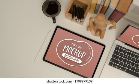 Top view of study table with mock up tablet, laptop, school elements, coffee mug and decoration 