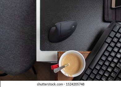 Top view table with mouse, keyboard and coffee. Workplace office homeworker.