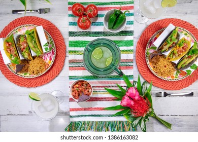 Top View Tacos And Margaritas On Colorfully Decorated Tabletop To Celebrate Cinco De Mayo