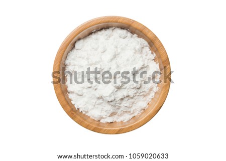 Top view tapioca starch powder in wooden bowl background isolate with clipping path