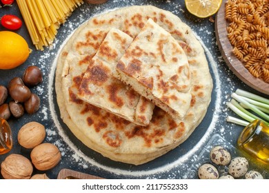 top view tasty flapjacks with different ingredients seasonings and pasta on dark background color bun meal food dish bread