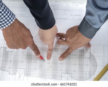 Top view teamwork concept, Engineer and workers discussing project of new building. ,Team of architects Asian people in group on construction site check documents and business workflow.