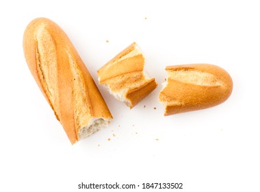 Top view of teared french baguette isolated on white background.