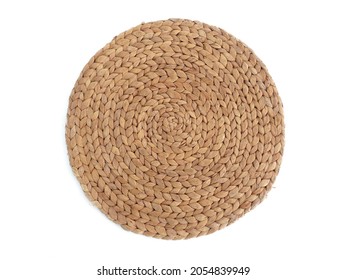 Top view texture of handmade round beige wicker tablecloth surface isolated on white background. Household utensils. Rustic decoration