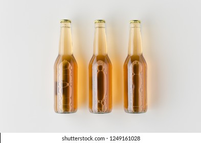 Top view of three beer bottles mockup.