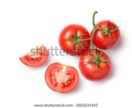Top view of tomato with slice isolated on white background.