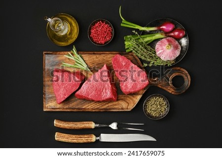 Top view of tri tip beef loin steak with spice and herbs