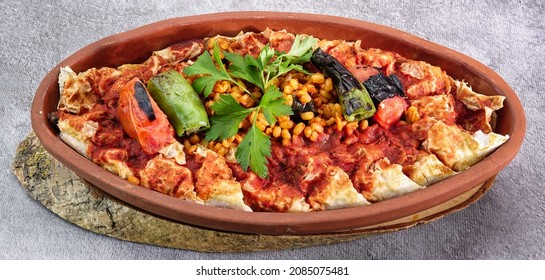 Top View Of Turkish Beyti Kebab Served With Bulgur Pilaf, Roasted Tomato, Pepper And Salsa