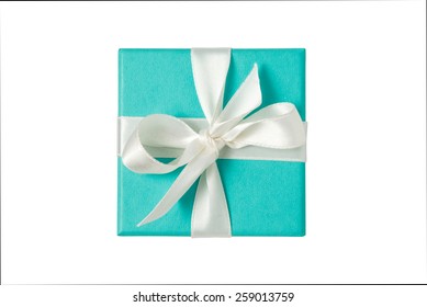 Top view of turquoise isolated gift box with white ribbon on white background - Shutterstock ID 259013759