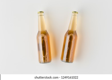 Top view of two beer bottles mockup.