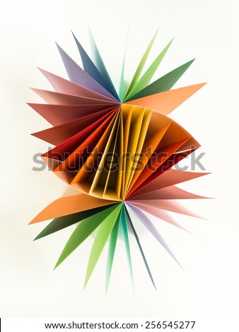 top view of two multi colored paper pads combined together on white background