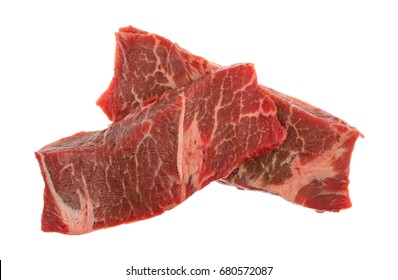 Top View Of Two Raw Beef Boneless Short Ribs Isolated On A White Background.