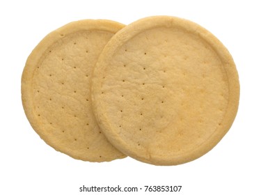 Top View Of Two Ready Made Deep Dish Pizza Crusts Isolated On A White Background.