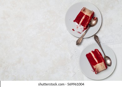 Top View Of Two Slices Of Red Velvet Cake With Copy Space.