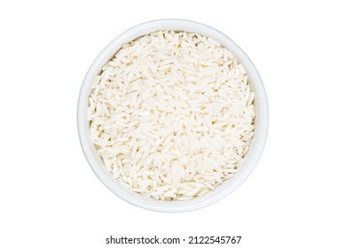 Top View Of Uncooked Jasmine Rice In White Ceramic Cup On White Background With Clipping Path.