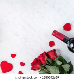 Top View Of Valentine Day Gift With Rose And Wine, Festive Design Concept For Special Holiday Dating Meal.